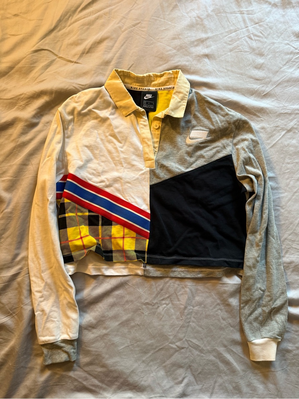 Nike Multi-Color Patchwork Rugby Cropped Polo - Yellow, Black, Gray, Blue, Red